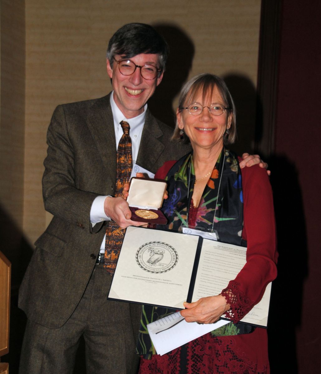 Brian Rose presents Susan Rotroff with the Gold Medal Award